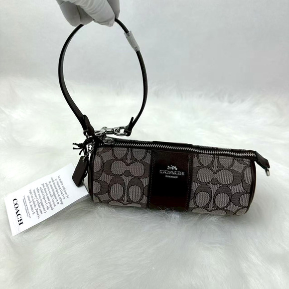 COACH Nolita Barrel Bag Wristlet In Signature Jacquard CU989 Oak Maple NWT - Picture 1 of 6
